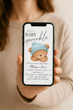 Person holding a phone with a baby sprinkle invitation on the screen